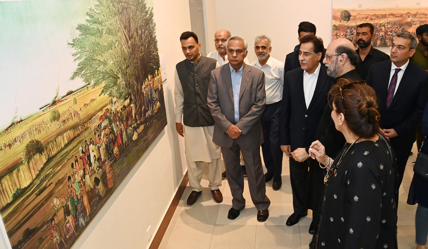 Speaker National Assembly Sardar Ayaz Sadiq viewing the Art Exhibition with the theme "A Tribute to the people of Pakistan" by Artist and Social Worker Jimmy Engineer (Servent of Pakistan) at PNAC.